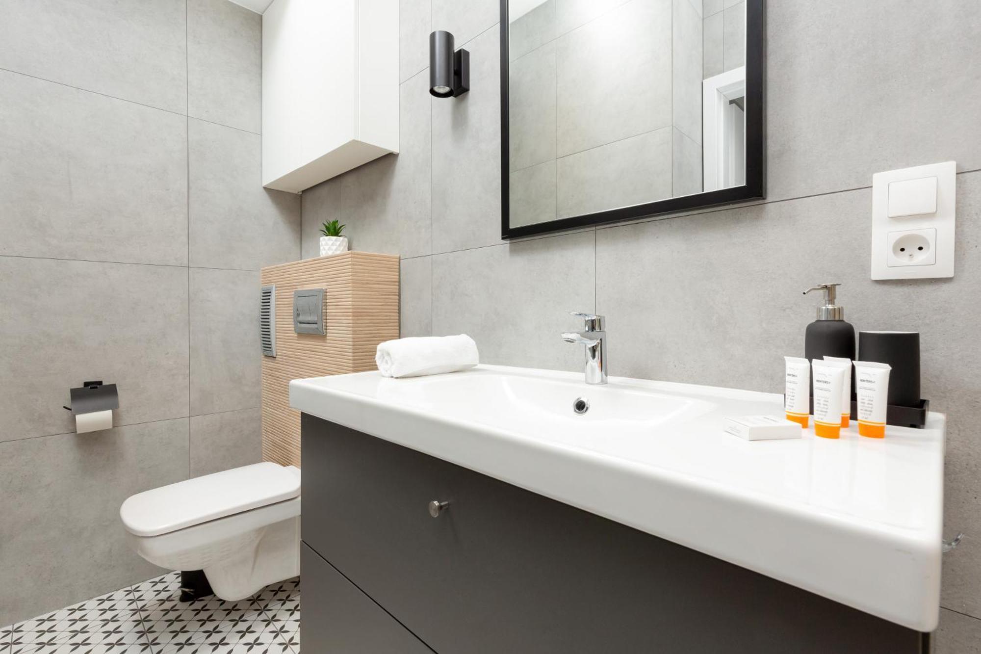 Central Apartment Emilii Plater By Noclegi Renters Warschau Buitenkant foto